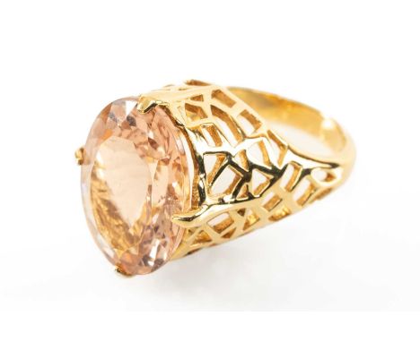 18CT MORGANITE RING, oval cut stone 18 x 13mm in high openwork setting, 11.3gProvenance: private collection Vale of Glamorgan