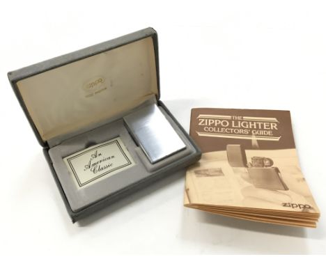 An American Zippo chrome cased 1932 replica cigarette lighter in original box.