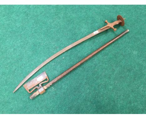 An Indian Sangin Tabar axe with metal blade and wooden shaft together with an Indian Shamsheer sword (latter rusted).