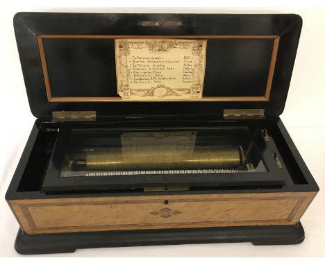 A late 19th century Swiss 8 Airs Musical box, housed in wooden case with inlaid banding &amp; marquetry. Movement by P.V.F. S