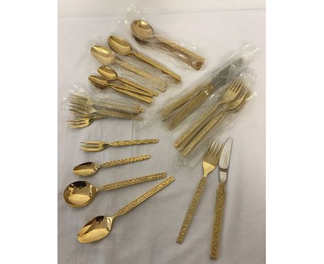 A set of continental gold plated cutlery by Webber &amp; Hill. Floral design to handles. 6 each of knives, forks, soup spoons