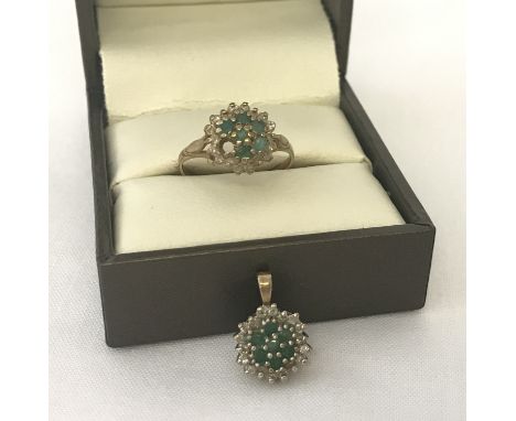 A 9ct gold dress ring and matching pendant, set with emeralds and diamonds. Both cluster design, each has 7 small round cut e