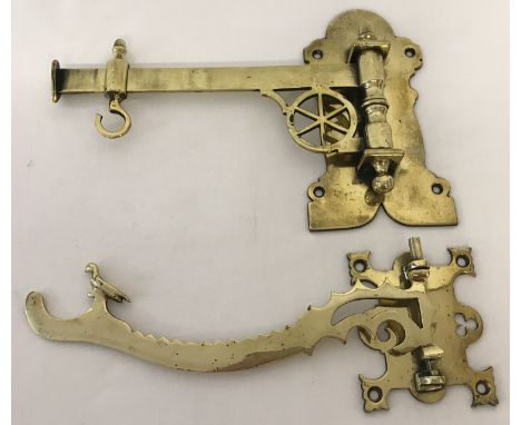 2 decorative Victorian brass, wall mountable lamp hooks, one with sliding hook.Longest approx. 28cm long.
