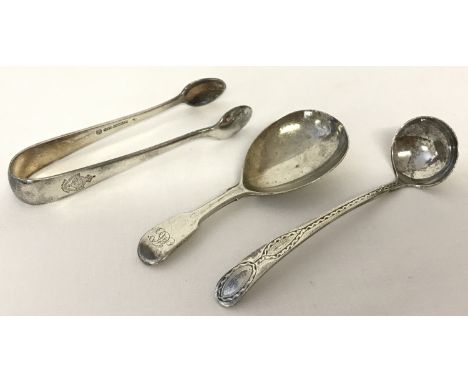 A Georgian silver caddy spoon by William Eley &amp; William Fearn. Together with a Georgian silver small sugar spoon and a pa