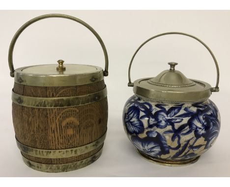 2 vintage biscuit barrels. A Victorian blue &amp; white ceramic barrel with lustre detail. Together with a brass banded woode