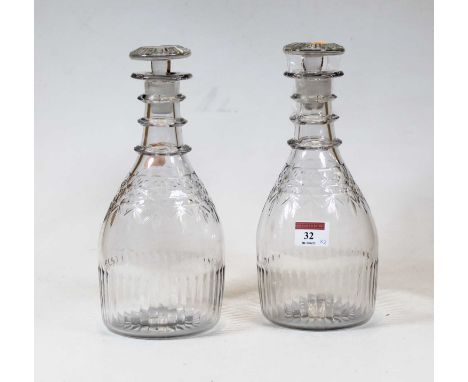 A pair of Regency style triple ring-neck decanters, each with mushroom stopper, h.26cmCondition report: Both intact but cloud