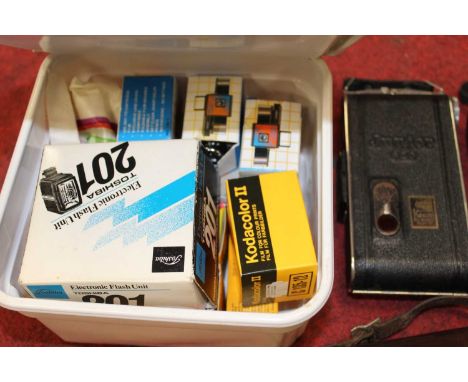 A box containing a collection of cameras to include an Agfa Optima, a Brownie 620 model E Kodak camera, a Kaupp Junior 620, a