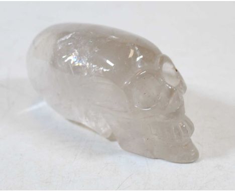 A rock crystal model of an elongated skull, length 13cmCondition report: No apparent damage but several internal inclusions w