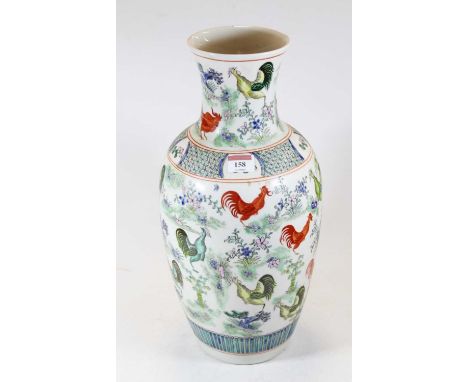 A large Chinese export porcelain vase of baluster form enamel decorated with cockerels amid flowers and foliage having a pseu