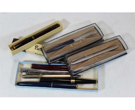 A Parker Vacumatic fountain pen having a 14 carat gold nib, boxed; together with various other Parker ball pens etcCondition 