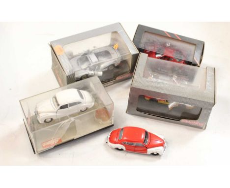 A small collection of boxed modern issue diecast toy vehicles to include a detailed Cars Collection model of a Ferrari F40,Sc