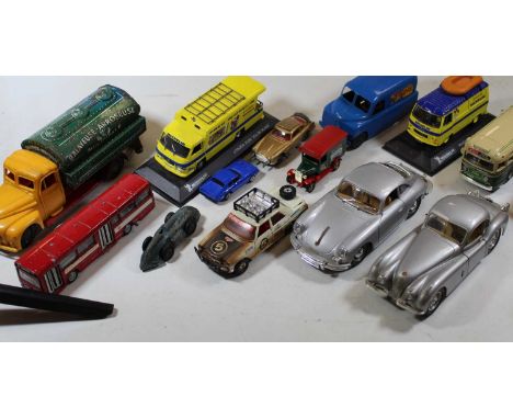 A box containing a collection of diecast and tinplate model vehicles to include a Burago Porsche 356