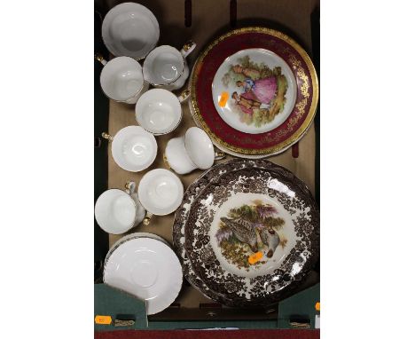 A box containing a collection of ceramics to include a Limoges plate decorated with a couple, a collection of Palissy plates 