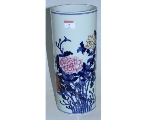 A Chinese stoneware vase of cylindrical form, enamel decorated with flowers and foliage having blue seal mark verso, height 3