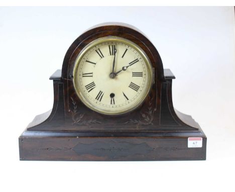 A late Victorian simulated walnut mantel clock, having an enamelled dial with Roman numerals and thirty hour movement, h.30cm