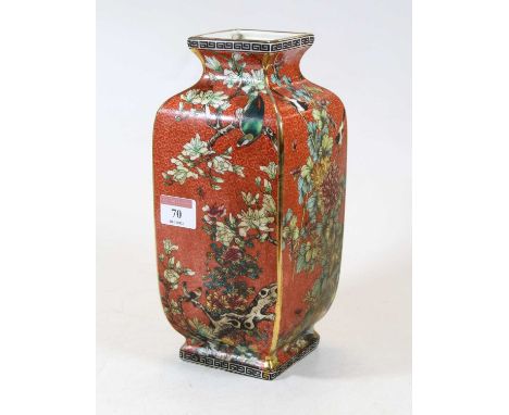 A modern Chinese vase, of square section, on a red ground, enamel decorated with birds amidst flowers and foliage, all within