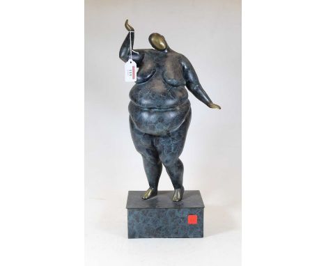 A contemporary bronzed model of a lady, in standing pose on a retcangular plinth, h.47cm