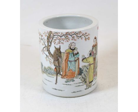 A Chinese export porcelain brush pot, enamel decorated with two figures and a horse beneath a tree, with Chinese script to th