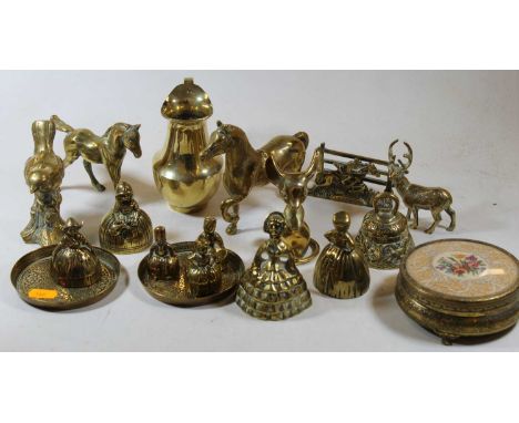 A collection of brassware to include animal figures and a brass handled walking stick