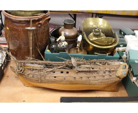 An 18th century style model ship (a/f), lacking sails, length 90cm