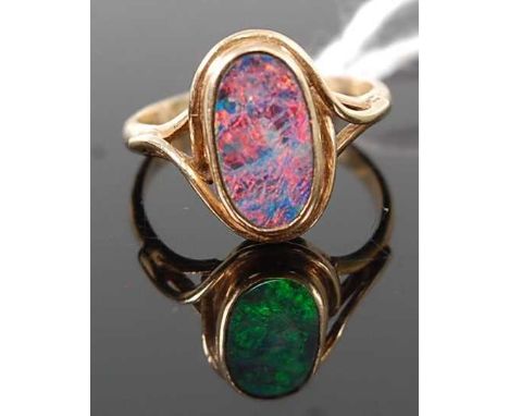 A lady's yellow metal and *DOUBLET* opal set dress ring, stamped 9ct, 2.6g, size LCondition report: Doublet, not fire, opal a