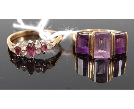 A modern 9ct gold baguette cut amethyst three-stone dress ring, 3.7g, size P; together with a yellow metal, amethyst and whit