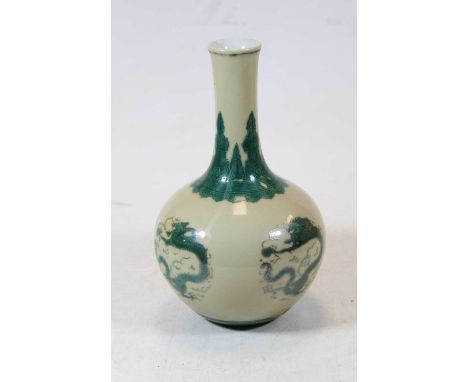 A Chinese porcelain bottle vase, having a slender neck to a bulbous lower body, enamel decorated with green dragons, having r