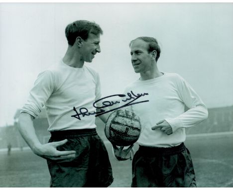 Jack Charlton signed 10x8 inch vintage black and white photo pictured with brother Bobby. Good Condition. All autographs come