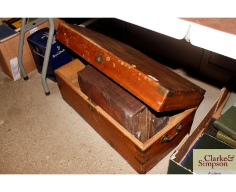 A small camphor wood and brass bound trunk; and a wooden nest of drawers
