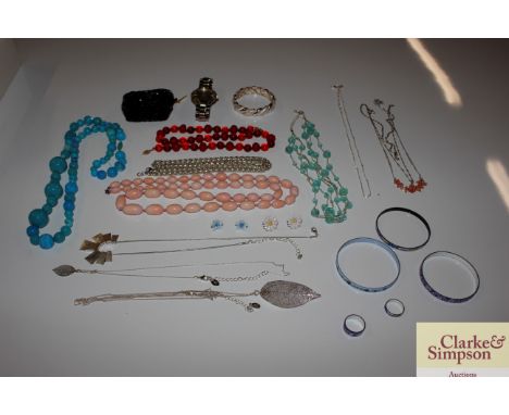 A collection of various vintage bead necklaces, enamel jewellery, costume jewellery etc.