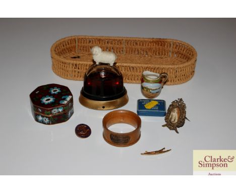 A small cloisonné octagonal box, a wooden napkin ring, a miniature frame and various other items 