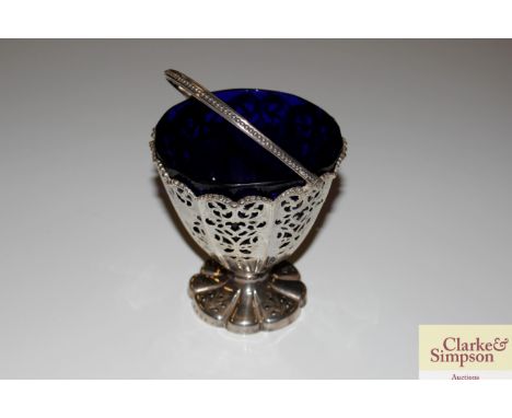 A Victorian silver sugar bowl, with pierced foliate decoration and blue glass liner, Sheffield 1854