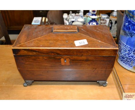 A 19th Century rosewood and boxwood strung tea caddy of sarcophagus shape
