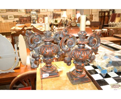 A pair of wooden urn shaped table lamp bases 