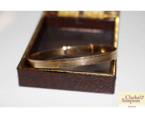 A vintage 1/5th micron 9ct gold bangle, 6.6gms