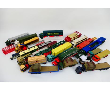 Britains - Corgi - EFE - Others - An unboxed group of over 20 diecast models including trucks, buses, truck trailers and truc