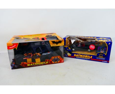 Batman - Mattel - Corgi. A Pair of boxed Batmobiles appearing in Excellent condition in Original boxes with some shrinkage an