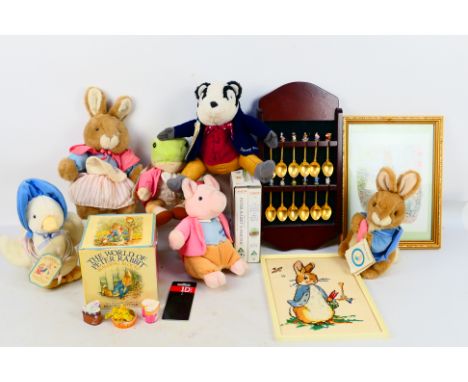 Beatrix Potter - A small group of Beatrix Potter soft toys, including Mrs.Rabbit, Peter Rabbit and similar with a group of Be