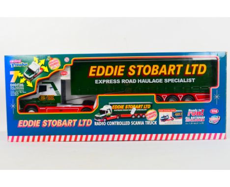 Control Freaks - A boxed 1:18 scale radio controlled 'Eddie Stobart Ltd.' Scania truck. The plastic model appears to be in Mi