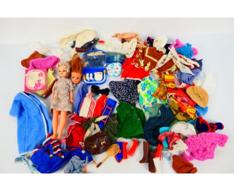 Palitoy - Sindy - An unboxed Hong Kong made Sindy style doll with a Sindy Doll head together with a large group of dolls clot