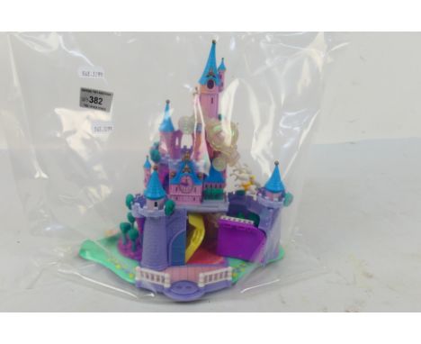 Polly Pocket - Bluebird - An unboxed vintage 1995 'Polly Pocket Disney - Cinderella Wedding Palace'. The item appears to be i