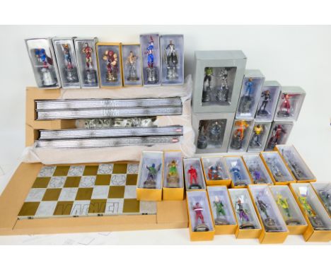 Eaglemoss - Marvel - A boxed Marvel Chess Set with 32 x boxed figures including Mandarin, Juggernaut, Klaw, Red Skull, Storm,