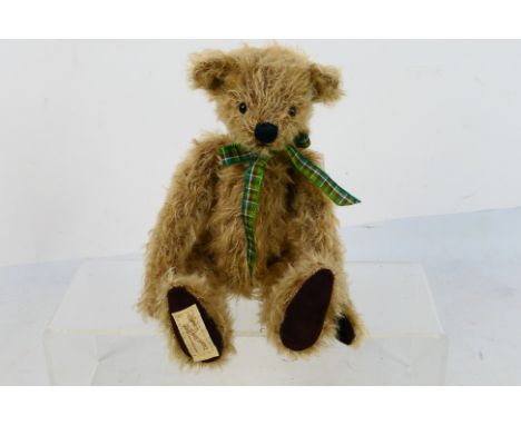 Dean's Rag Book - A limited edition jointed mohair bear named Hugo made for the Dean's Collectors Club members in 2001. The b