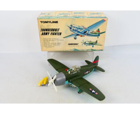 Tomyline - No. 67 Thunderbolt Army Fighter. A boxed large scale battery operated toy model WWII Thunderbolt warplane from the