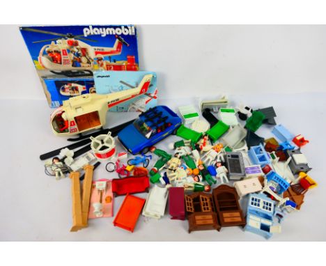 Playmobil - A collection of loose Playmobil accessories and sets. Lot includes Playmobil #3739 Family Swift GSi; #3789 Rescue