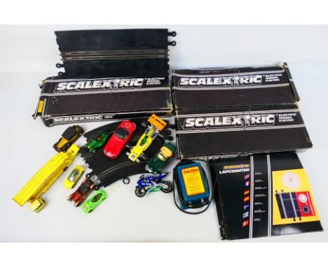 Hot Wheels, Scalextric, Maisto - A mixed lot of die-cast, plastic vehicles and boxed Scalextric track. Vehicles range from pl