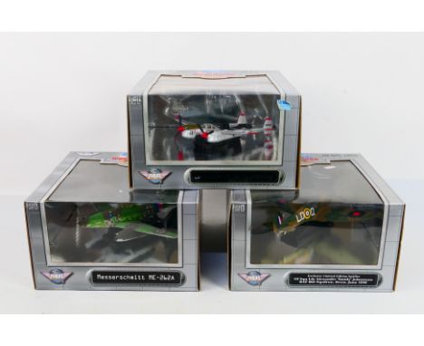 Air Signature - Three boxed Air Signature diecast model aircraft in various scales. Lot consists of 99108 Lockheed P38 Lightn