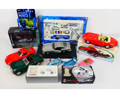 Luxe Car - Corgi - Chad Valley - New Ray - Bburago. Eleven boxed and loose diecast models appearing in Playworn to Excellent 