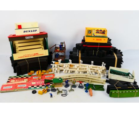 Scalextric - A collection of vintage Scalextric including track, a grandstand, a TV camera tower, trackside barriers and some