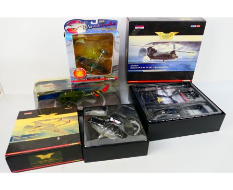 Corgi Aviation Archive - Four boxed diecast military aircraft in various scales. Lot consists of  AA50413 1:48 Bell UH-IE 518